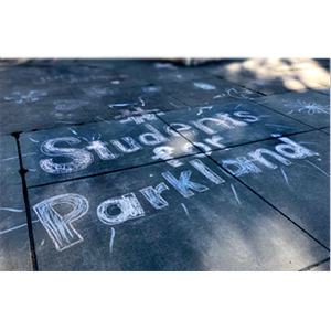 Chalk drawing of students supporting Parkland
