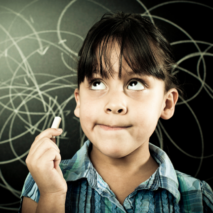 a student in front of a chalkboard with a piece of chalk in her hand.  She is looking up and look to be thinking or remembering
